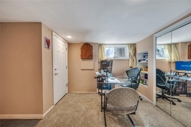 carpeted office featuring recessed lighting and baseboards