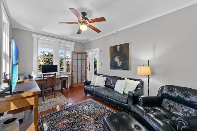 living room with ceiling fan, wood finished floors, an office area, and crown molding