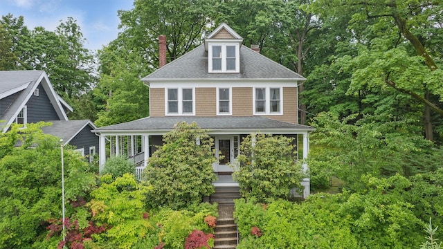 101 Mohican Park Ave, Dobbs Ferry, NY 10522 - american foursquare style home with a chimney, covered porch, and a shingled roof