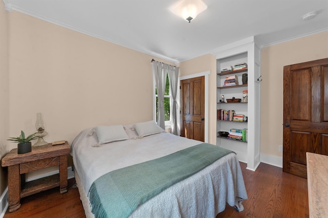 101 Mohican Park Ave, Dobbs Ferry, NY 10522 - bedroom with dark wood-style flooring, ornamental molding, and baseboards