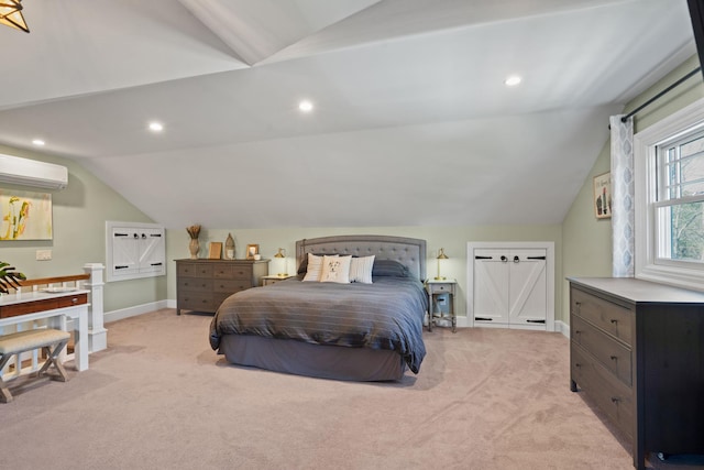 bedroom featuring light colored carpet, baseboards, a wall mounted AC, and lofted ceiling