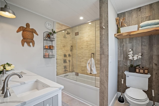 bathroom with a sink, bath / shower combo with glass door, toilet, ornamental molding, and recessed lighting