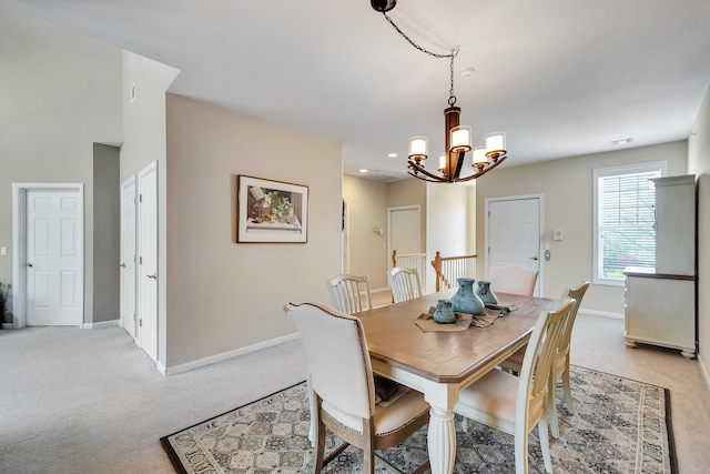 10 Symphony Dr, Lake Grove, NY 11755 - dining area featuring baseboards, recessed lighting, a notable chandelier, and light carpet