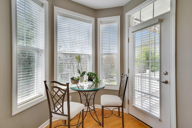 10 Symphony Dr, Lake Grove, NY 11755 - dining space with wood finished floors and baseboards