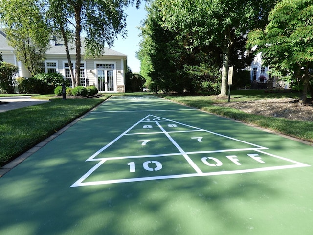 10 Symphony Dr, Lake Grove, NY 11755 - view of community with a lawn and shuffleboard