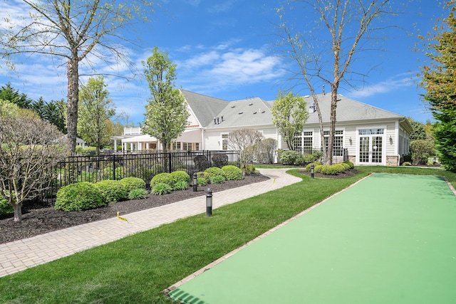 10 Symphony Dr, Lake Grove, NY 11755 - view of property's community featuring a lawn and fence