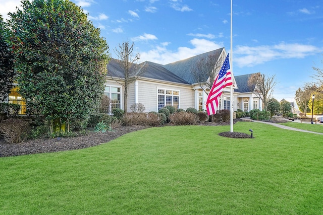 10 Symphony Dr, Lake Grove, NY 11755 - view of front of home with a front lawn