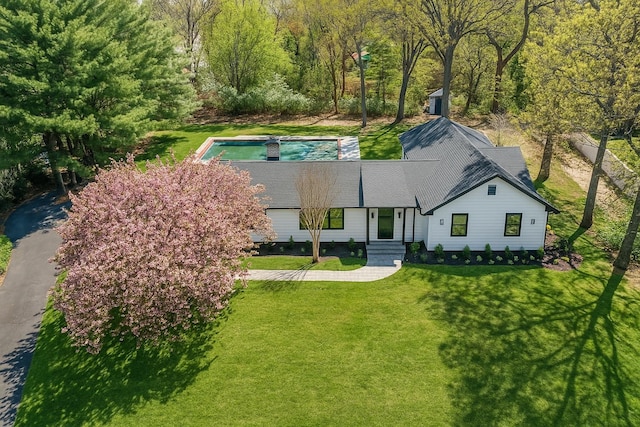 view of front of house with a front lawn