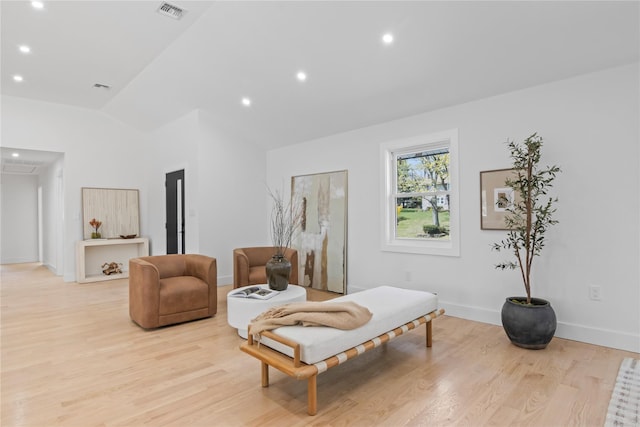 living area with baseboards, recessed lighting, light wood-style flooring, and visible vents