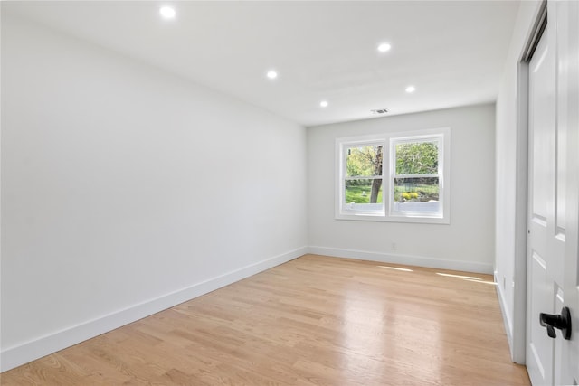 7 Breezy Hill Dr, Northport, NY 11768 - empty room with baseboards, light wood-type flooring, and recessed lighting