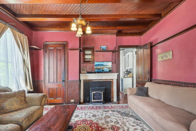 10 Wheeler Ave, Warwick, NY 10990 - living room featuring wood ceiling, plenty of natural light, wainscoting, and beam ceiling