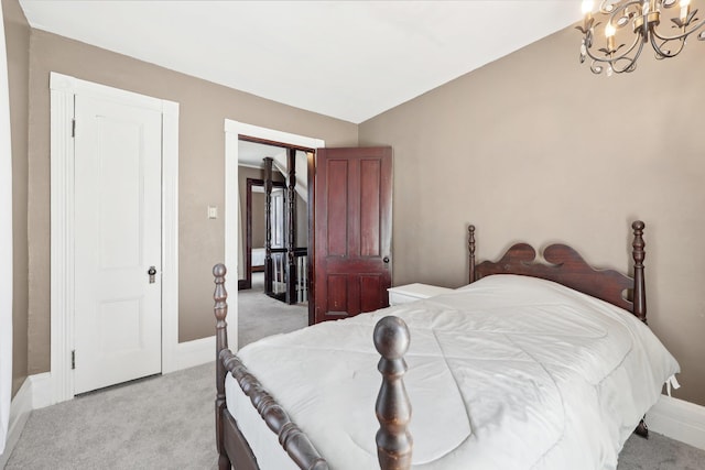 10 Wheeler Ave, Warwick, NY 10990 - bedroom with baseboards, a chandelier, and light carpet
