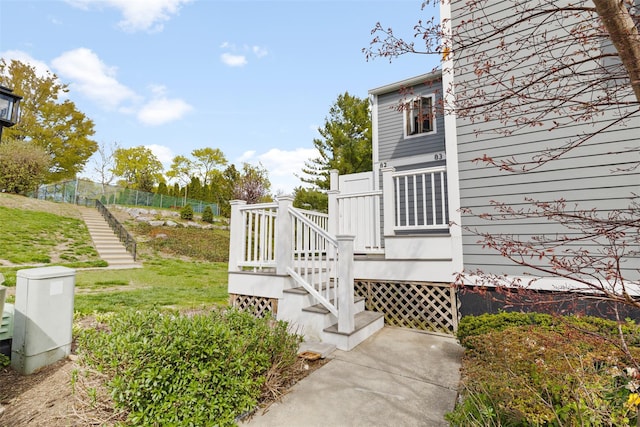 exterior space with a deck and stairway