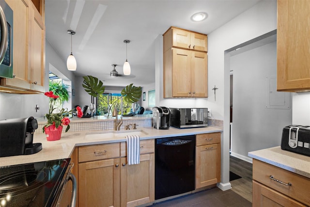 kitchen featuring stainless steel microwave, a sink, light brown cabinets, black dishwasher, and pendant lighting