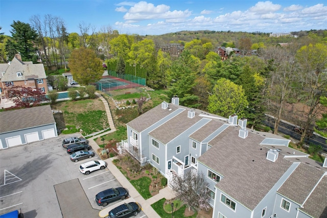 aerial view with a wooded view