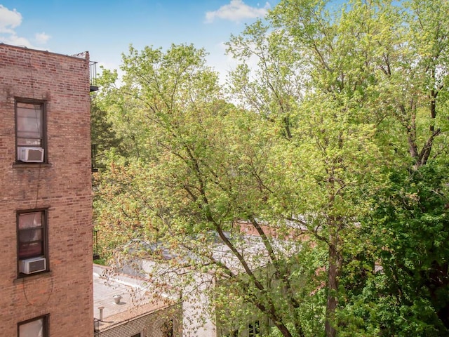 6535 Broadway Unit 5C, Bronx, NY 10471 - view of side of home with brick siding and cooling unit