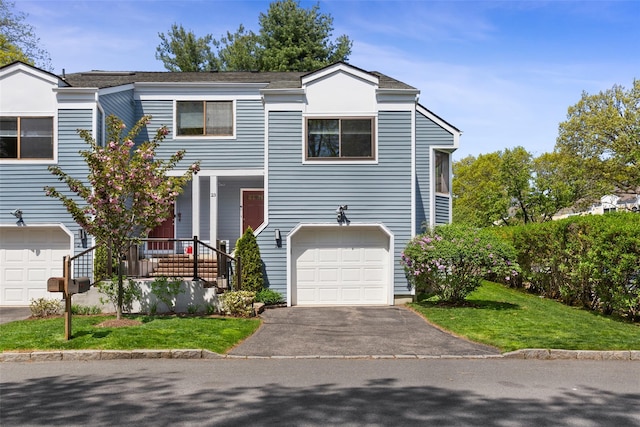 23 Top Of The Rdg Unit A8, Mamaroneck, NY 10543 - view of front of property with an attached garage, a front yard, and aphalt driveway