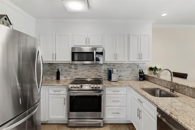 23 Top Of The Rdg Unit A8, Mamaroneck, NY 10543 - kitchen featuring white cabinets, appliances with stainless steel finishes, ornamental molding, and a sink