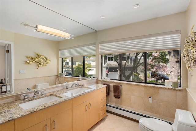 23 Top Of The Rdg Unit A8, Mamaroneck, NY 10543 - bathroom with a sink, baseboard heating, toilet, and visible vents