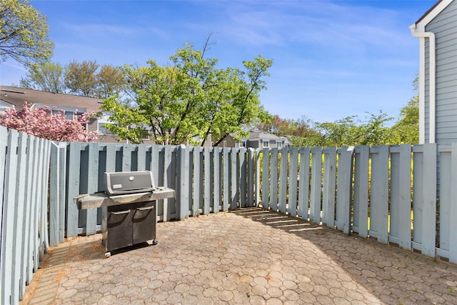 23 Top Of The Rdg Unit A8, Mamaroneck, NY 10543 - view of patio with a grill and a fenced backyard