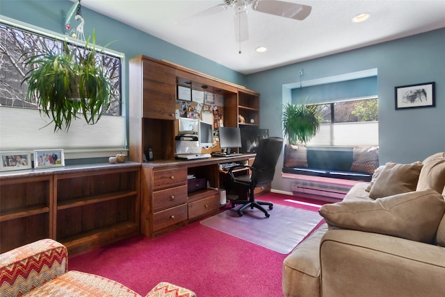 carpeted office space featuring recessed lighting, a baseboard heating unit, and ceiling fan