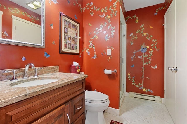 full bath with a shower stall, a baseboard heating unit, toilet, vanity, and tile patterned flooring
