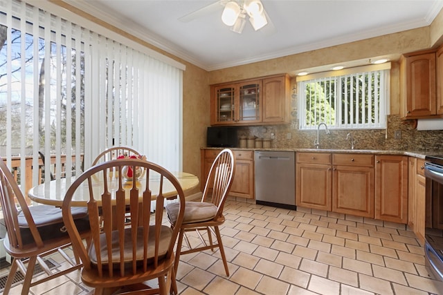 kitchen featuring stainless steel dishwasher, a ceiling fan, ornamental molding, and decorative backsplash