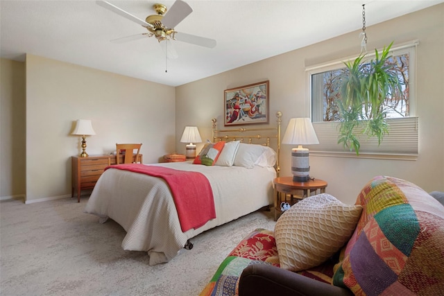 bedroom with carpet flooring, ceiling fan, and baseboards