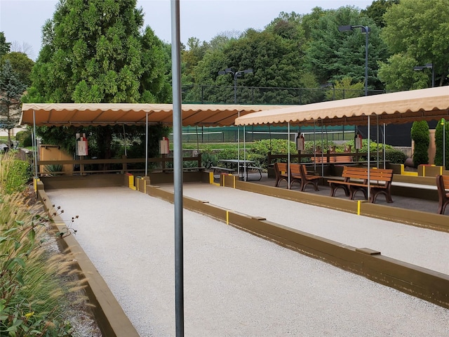 view of property's community with fence