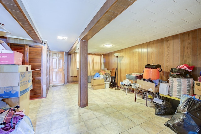225-54 Murdock Ave, Queens Village, NY 11429 - finished basement with tile patterned floors and wooden walls