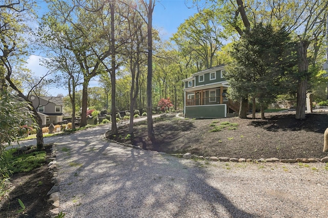 view of yard featuring a sunroom