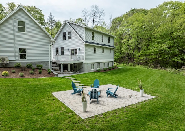 16 Anderson Rd, Pawling, NY 12564 - back of property featuring a patio, a lawn, stairs, a deck, and ac unit
