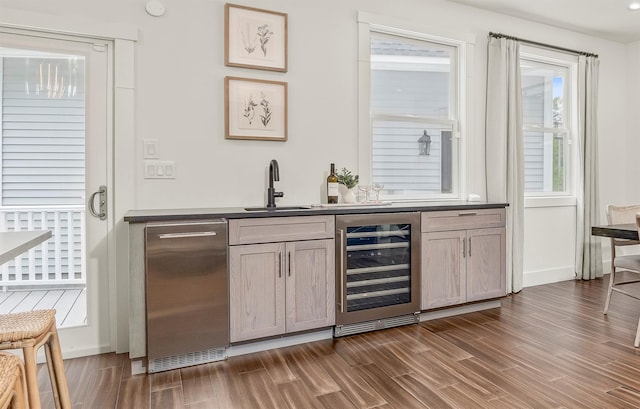16 Anderson Rd, Pawling, NY 12564 - indoor wet bar featuring beverage cooler, dark wood-style flooring, and baseboards