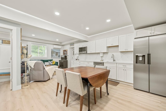 16 Anderson Rd, Pawling, NY 12564 - dining area with light wood finished floors and recessed lighting