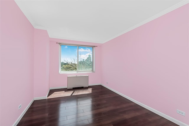 3333 Henry Hudson Pkwy Unit 7C, Bronx, NY 10463 - empty room featuring radiator heating unit, wood finished floors, ornamental molding, and baseboards