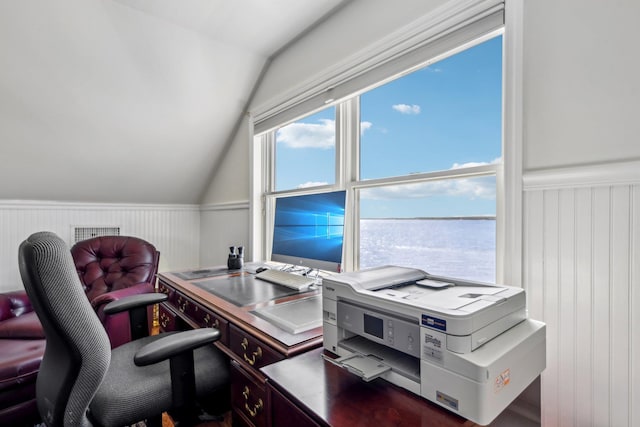 office featuring wainscoting and lofted ceiling
