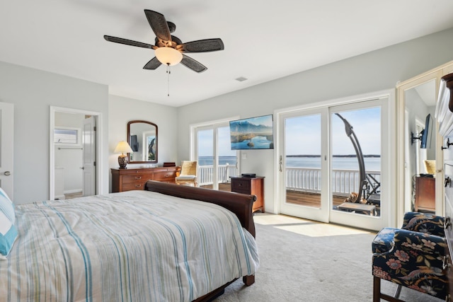 bedroom with carpet floors, access to outside, and ceiling fan