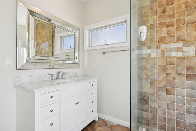 full bath featuring vanity and tiled shower