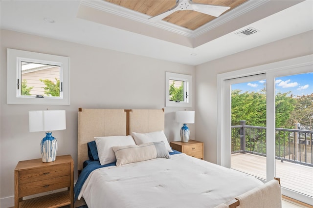 260 Wilmot Rd, Ocean Beach, NY 11770 - bedroom featuring crown molding, visible vents, access to exterior, and a raised ceiling