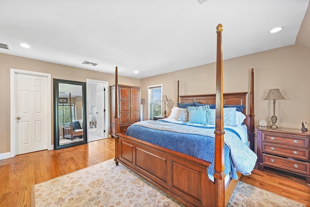 bedroom featuring recessed lighting, light wood finished floors, and visible vents