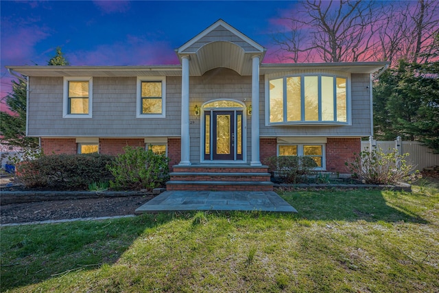 29 Fairway Dr, Rocky Point, NY 11778 - split foyer home with a yard and fence