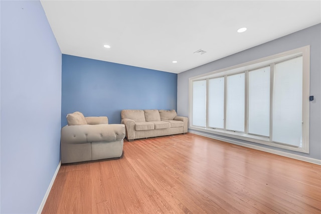 29 Fairway Dr, Rocky Point, NY 11778 - living area with light wood-type flooring, baseboards, visible vents, and recessed lighting