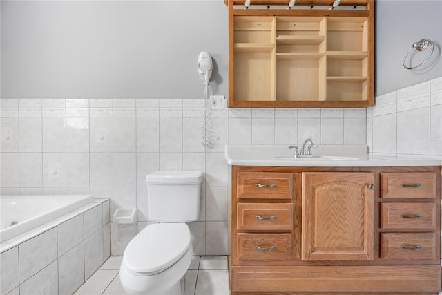 29 Fairway Dr, Rocky Point, NY 11778 - bathroom with toilet, a jetted tub, vanity, and tile walls
