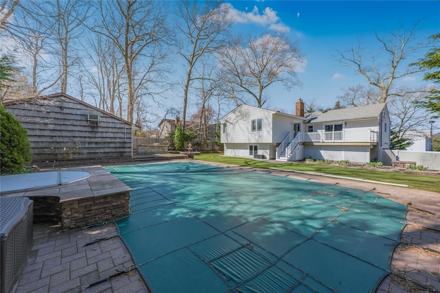 29 Fairway Dr, Rocky Point, NY 11778 - view of pool featuring a fenced in pool, a wooden deck, stairway, an outdoor structure, and a yard