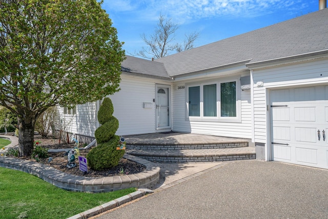 entrance to property with a garage