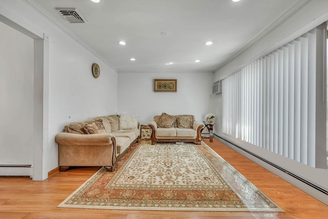 living area with ornamental molding, visible vents, light wood-style floors, and a baseboard radiator