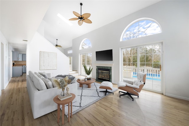 280 Shinnecock Hills Rd, Southampton, NY 11968 - living area featuring a ceiling fan, high vaulted ceiling, wood finished floors, and a fireplace