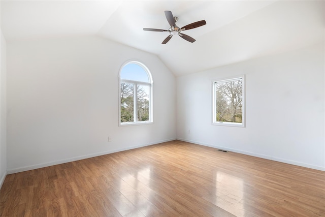 280 Shinnecock Hills Rd, Southampton, NY 11968 - spare room featuring baseboards, a ceiling fan, light wood-style flooring, and vaulted ceiling