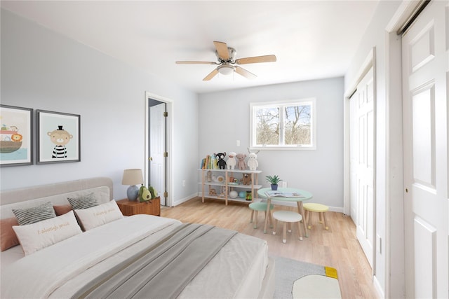 280 Shinnecock Hills Rd, Southampton, NY 11968 - bedroom featuring a closet, baseboards, a ceiling fan, and light wood-style floors