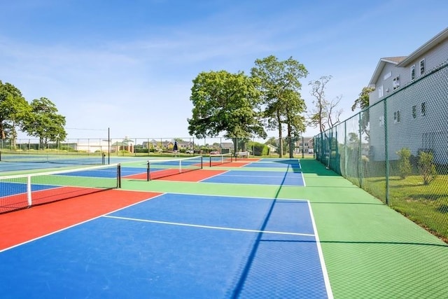 view of sport court featuring fence and community basketball court